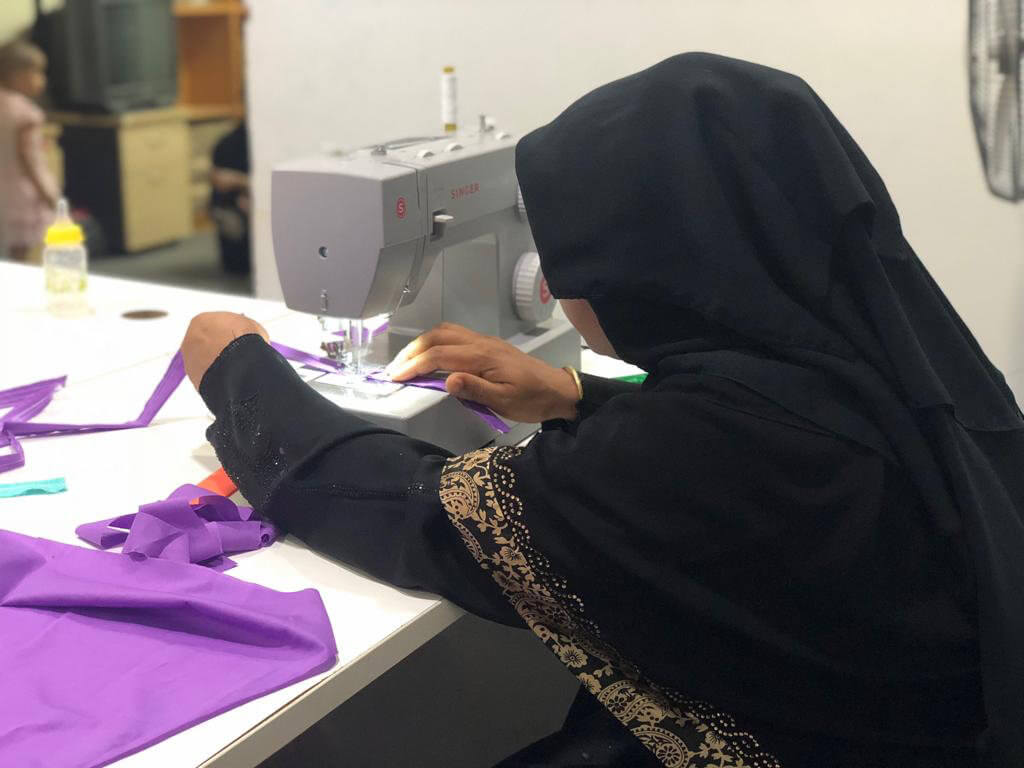 Rohingya refugee woman sews clothing through an RWDN livelihood program, Kuala Lumpur, Malaysia. ©RWDN 2019